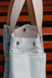 Bolsa Nuna Azul com Alças de Couro Off White