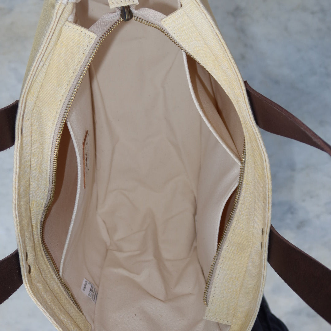 Bolsa Nuna Amarela com Alças de Couro Marrom Escuro