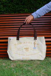 Bolsa Wallow Amarelo com Alça de Couro Marrom Escuro