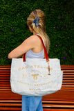 Bolsa Wallow Azul com Alça de Couro Marrom