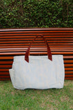 Bolsa Wallow Azul com Alça de Couro Marrom