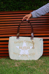 Bolsa Nuna Aqua com Alças de Couro Marrom Vinil