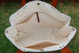 Bolsa Wallow Azul com Alça de Couro Marrom