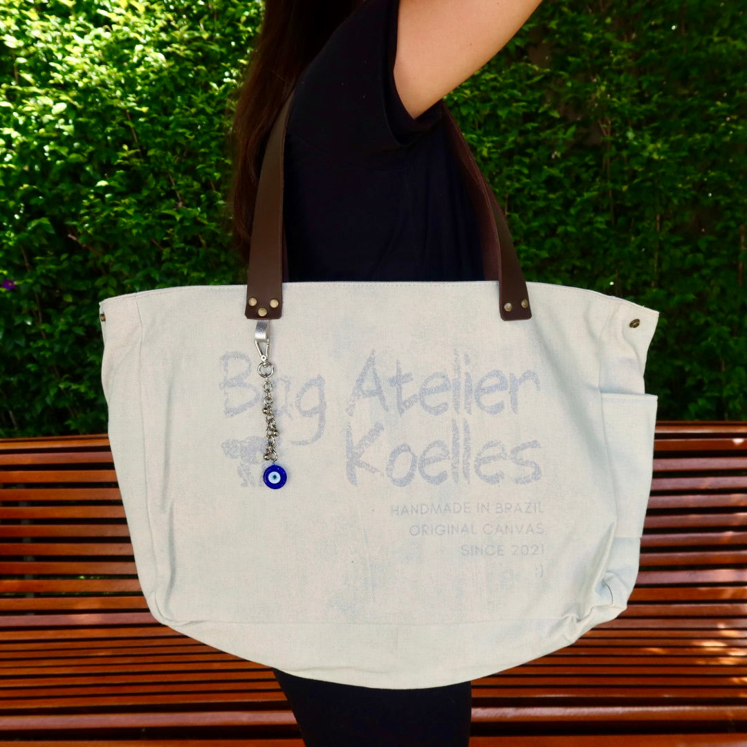 Bolsa Wallow Azul com Alça de Couro Marrom Escuro