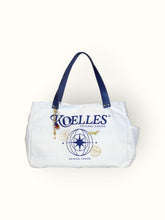 Bolsa Wallow Azul com Alça de Couro Marinho
