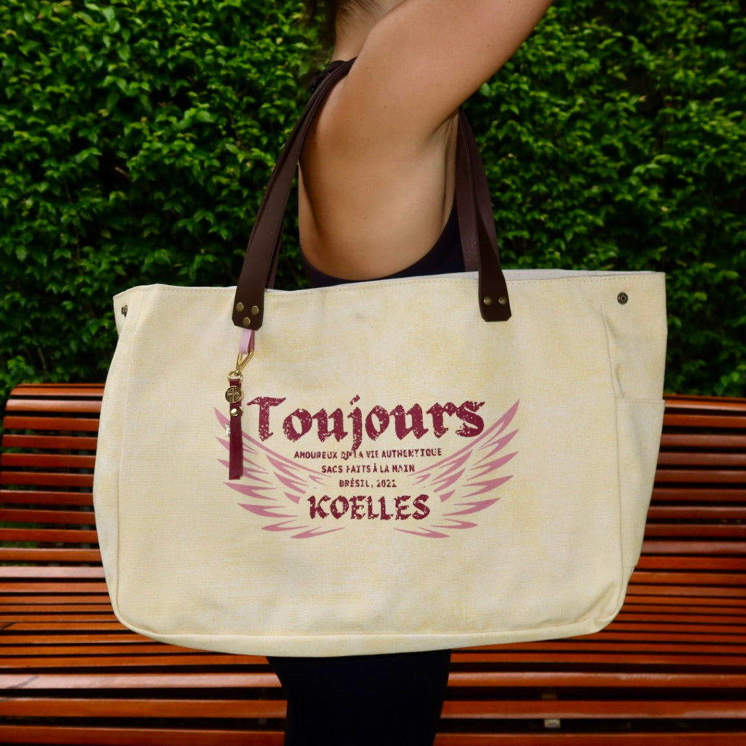 Bolsa Wallow Amarela com Alça de Couro Marrom Escuro