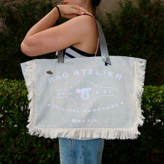 Bolsa Wallow Aqua com Alça de Couro Prata com Zíper