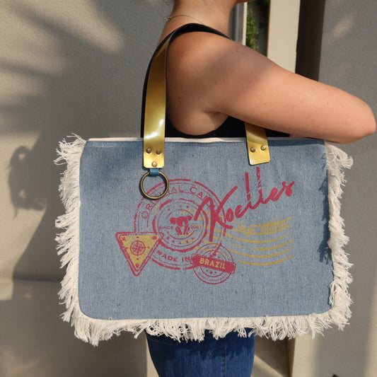 Bolsa Nuna Jeans Claro com Alças de Couro Dourada e Prata