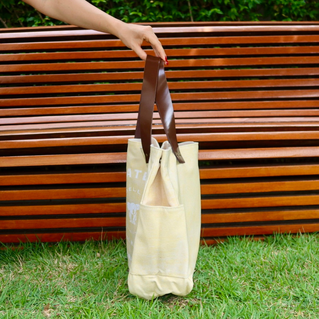 Bolsa Wallow Amarela com Alça de Couro Marrom Escuro