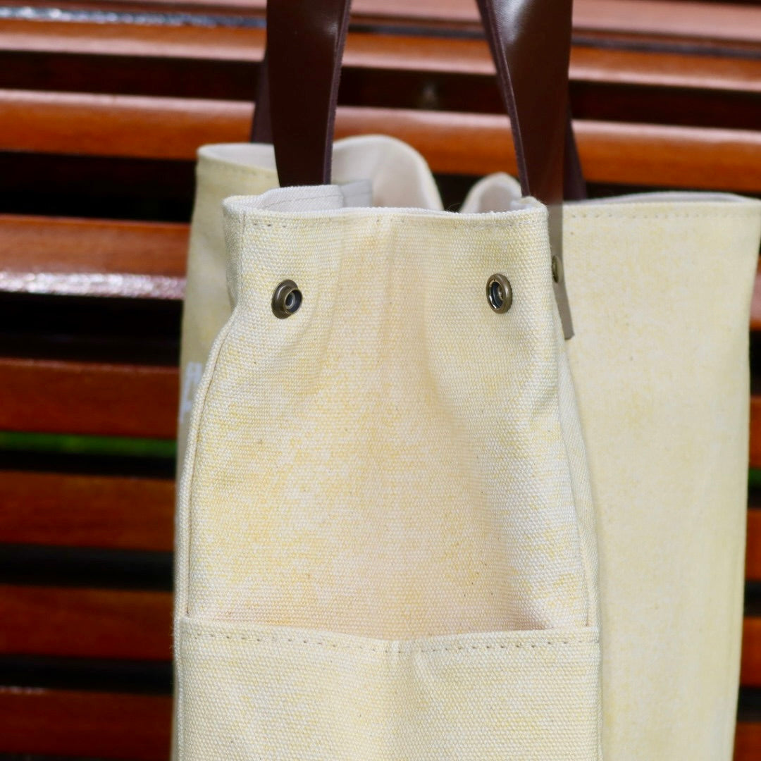 Bolsa Wallow Amarela com Alça de Couro Marrom Escuro