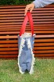 Bolsa Wallow Jeans Claro com Alça de Couro Vermelho