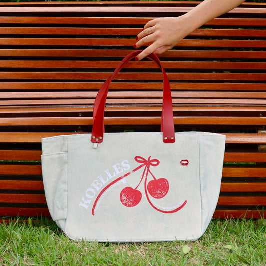 Bolsa Nuna Aqua com Alças de Couro Vermelho