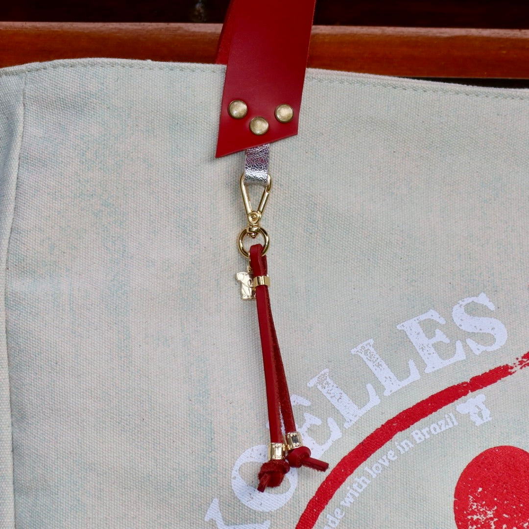 Bolsa Wallow Azul com Alça de Couro Vermelho