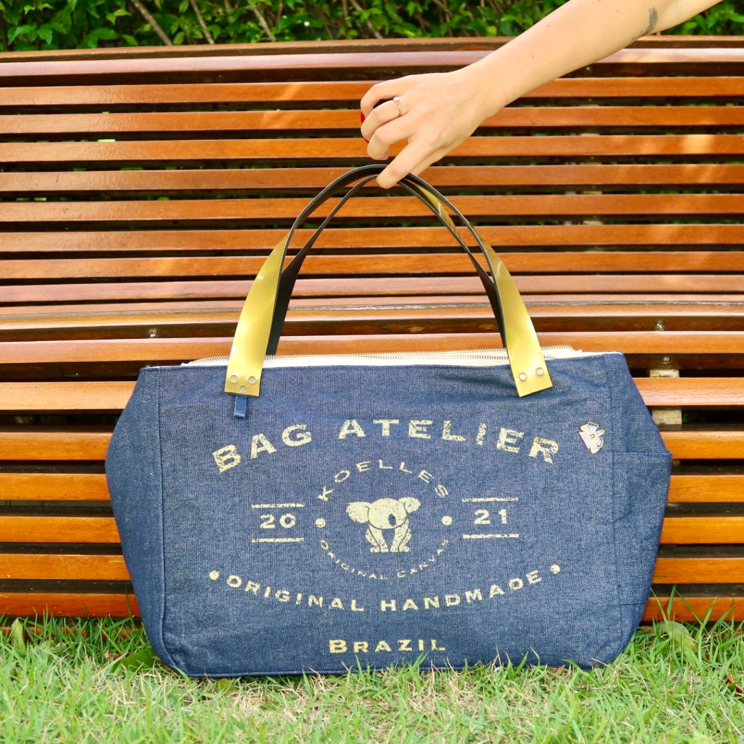 Bolsa Wallow Jeans Escuro com Alça de Couro Dourado com Zíper