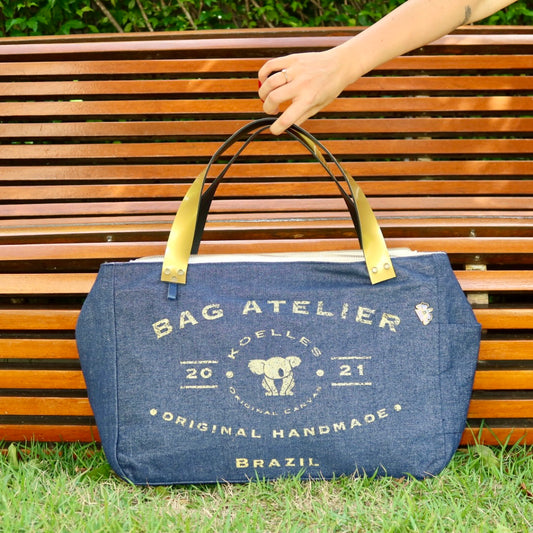 Bolsa Wallow Jeans Escuro com Alça de Couro Dourado com Zíper