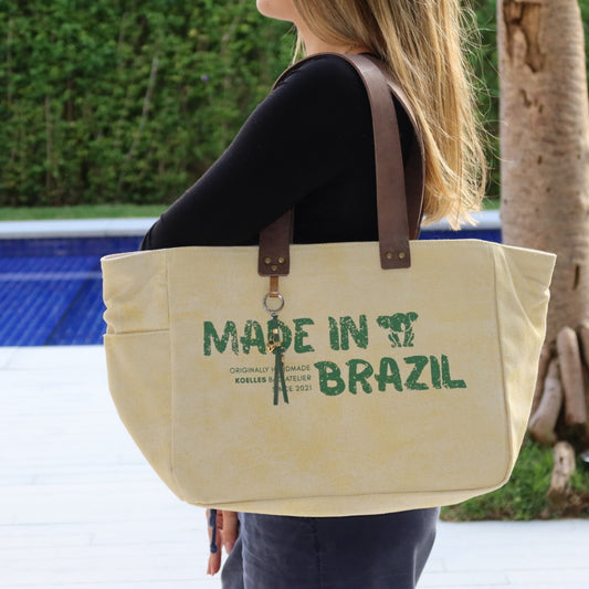 Bolsa Nuna Amarela com Alças de Couro Marrom Escuro