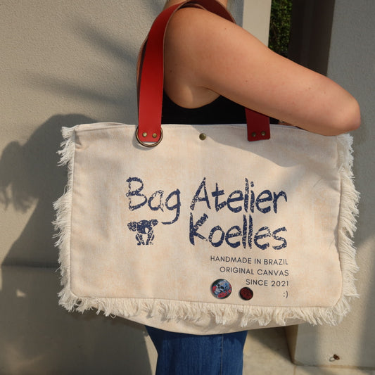 Bolsa Wallow Bege com Alça de Couro Vermelho