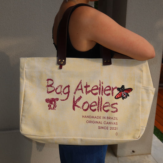 Bolsa Wallow Amarela com Alça de Couro Marrom