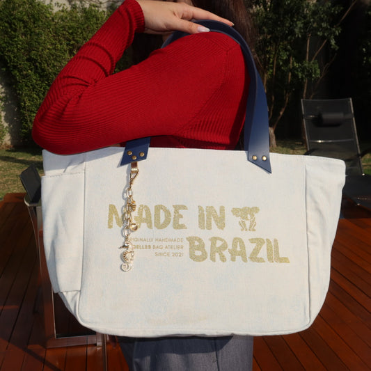 Bolsa Nuna Azul com Alças de Couro Marinho