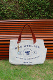Bolsa Wallow Azul com Alça de Couro Marrom