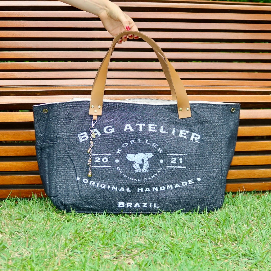 Bolsa Wallow Jeans Preto com Alça de Couro Caramelo com Zíper