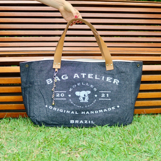 Bolsa Wallow Jeans Preto com Alça de Couro Caramelo com Zíper