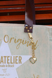 Bolsa Nuna Aqua com Alças de Couro Marrom Vinil