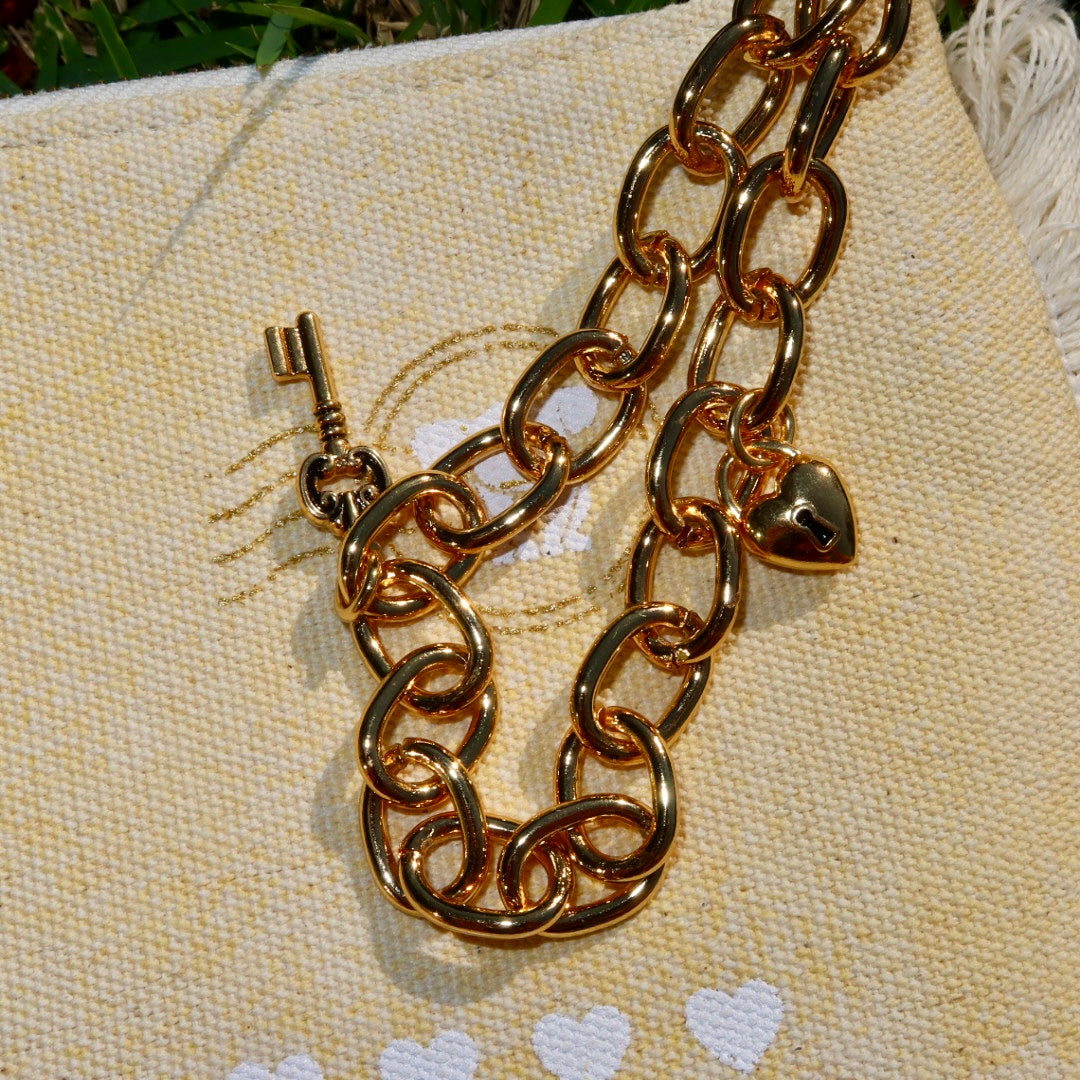 Necessaire Flat Amarela Estampada (Dourado e Branco)