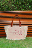 Bolsa Nuna Rosa com Alças de Couro Marrom com Zíper