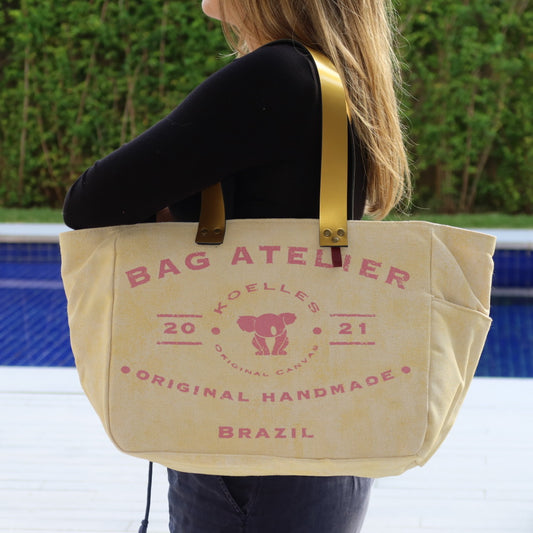 Bolsa Nuna Amareça com Alças de Couro Dourada