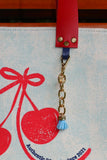Bolsa Nuna Aqua com Alças de Couro Vermelho