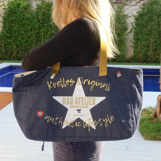 Bolsa Wallow Jeans Escuro com Alça de Couro Dourado