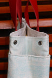 Bolsa Nuna Aqua com Alças de Couro Vermelho