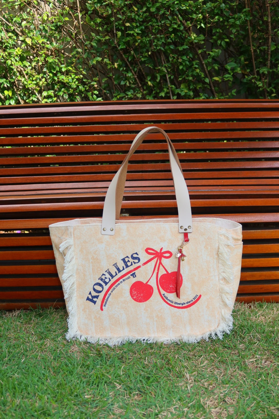 Bolsa Nuna Laranja com Alças de Couro Off White com Zíper