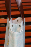 Bolsa Nuna Aqua com Alças de Couro Marrom Vinil