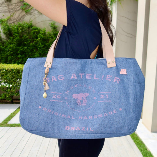 Bolsa Wallow Jeans Claro com Alça de Couro Pêssego