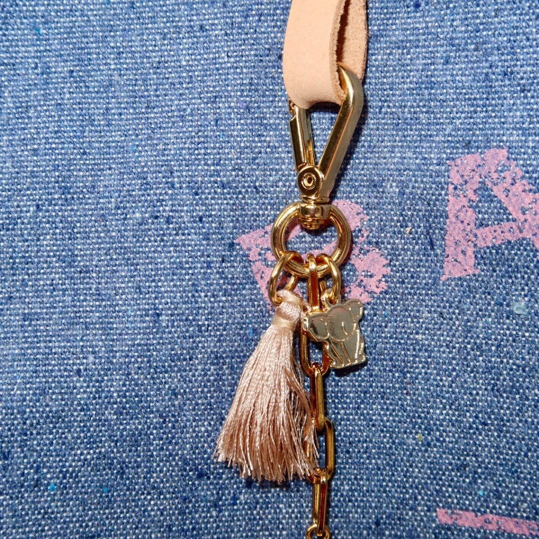 Bolsa Wallow Jeans Claro com Alça de Couro Pêssego