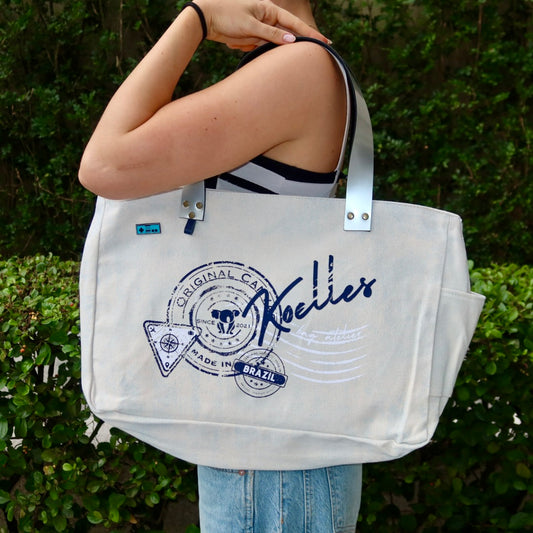 Bolsa Wallow Azul com Alça de Couro Prata