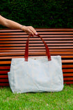 Bolsa Wallow Azul com Alça de Couro Marrom