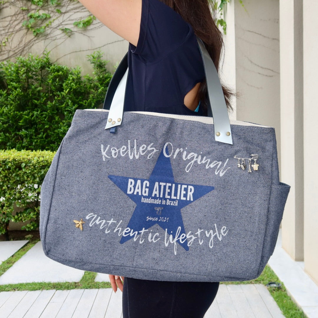 Bolsa Wallow Cinza com Alça de Couro Prata