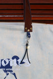 Bolsa Wallow Azul com Alça de Couro Marrom Vinil com Zíper