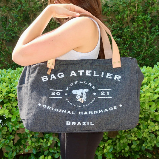 Bolsa Wallow Jeans Preto com Alça de Couro Caramelo com Zíper