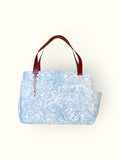 Bolsa Wallow de lona estampa arabesque turquesa com alça de couro marrom
