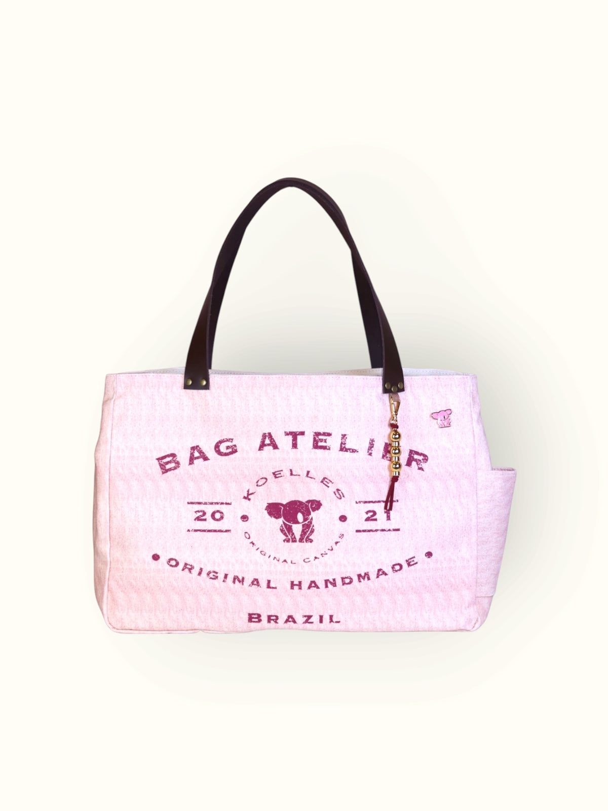 Bolsa Wallow Rosa com Alça de Couro Marrom Escuro