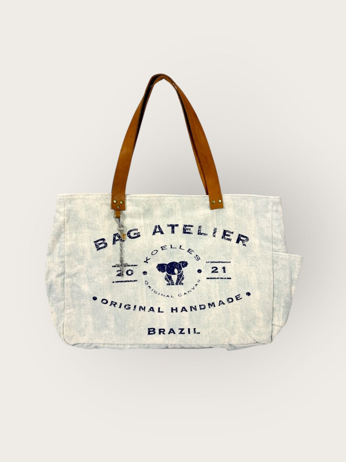 Bolsa Wallow Aqua com Alça de Couro Caramelo