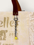 Bolsa Nuna Amarela com Alças de Couro Marrom com Zíper