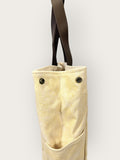 Bolsa Wallow Amarela com Alça de Couro Marrom Escuro