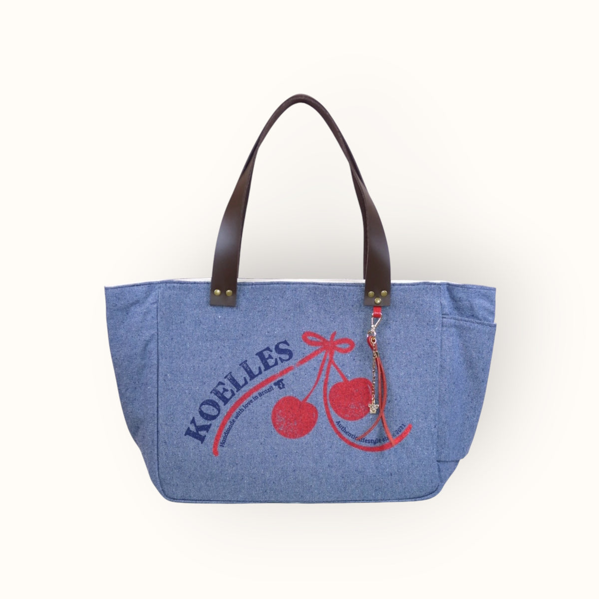 Bolsa Nuna Jeans Claro com Alças de Couro Marrom Escuro